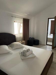 Postel nebo postele na pokoji v ubytování Vila Anir