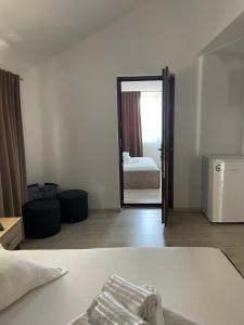 Postel nebo postele na pokoji v ubytování Vila Anir