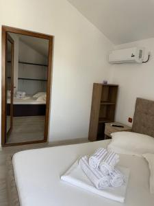 Postel nebo postele na pokoji v ubytování Vila Anir