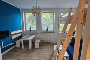 Μια τηλεόραση ή/και κέντρο ψυχαγωγίας στο Appartement direkt am Fluss
