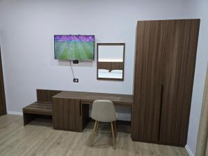 TV a/nebo společenská místnost v ubytování Hotel Aleks