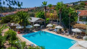 an overhead view of a swimming pool at a resort at Golden Lighthouse Hotel in Patara