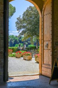Palazzo Massaini - Le Scuderie外面的花园