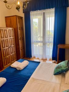 Ένα ή περισσότερα κρεβάτια σε δωμάτιο στο Apartment w/ spacious terrace