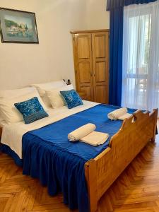 Ένα ή περισσότερα κρεβάτια σε δωμάτιο στο Apartment w/ spacious terrace