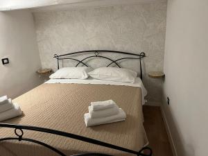 Ένα ή περισσότερα κρεβάτια σε δωμάτιο στο Sweet home Palermo +10 φωτογραφίες