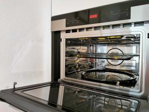 Kuchyň nebo kuchyňský kout v ubytování Apartment Simonhöhe