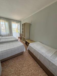 Postel nebo postele na pokoji v ubytování Joni Mari
