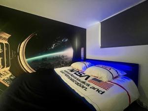 Fotografie z fotogalerie ubytování Objectif Cosmos Magnifique T2 à 4 min du parc v destinaci Chasseneuil-du-Poitou