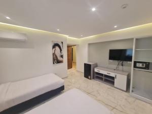 Voodi või voodid majutusasutuse El Mesaadya Hotel فندق المساعدية toas