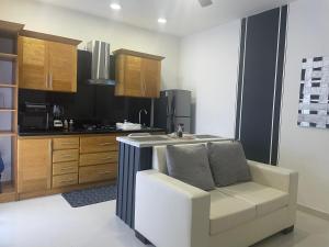 Kuchyň nebo kuchyňský kout v ubytování Gaia Residence Deluxe