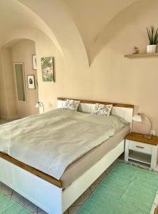 Postel nebo postele na pokoji v ubytování Apartmán Dominikánská