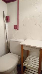 a bathroom with a toilet and a sink at Studio Loft in Belgentier +21 photos