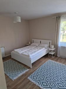 Postel nebo postele na pokoji v ubytování Casa Balint