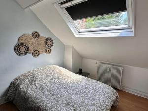 Ένα ή περισσότερα κρεβάτια σε δωμάτιο στο La Loge et La Pause Compiègnoise