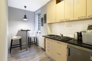 Kuchyňa alebo kuchynka v ubytovaní Studio Apartment Baltazar Zagreb centre