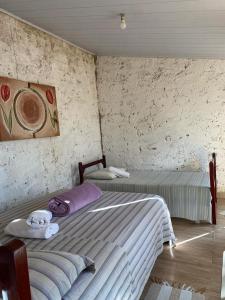 Postel nebo postele na pokoji v ubytování Sitio Loca do Pequi