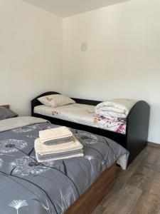 Postel nebo postele na pokoji v ubytování Apartmani Vrla NEW