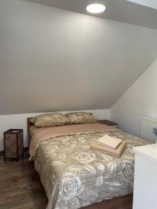 Postel nebo postele na pokoji v ubytování Apartmani Vrla NEW