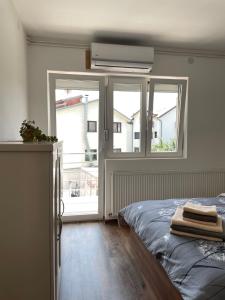 Postel nebo postele na pokoji v ubytování Apartmani Vrla NEW