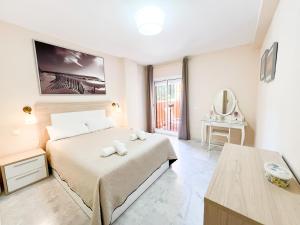 Posteľ alebo postele v izbe v ubytovaní Apartamento la Reserva de Marbella
