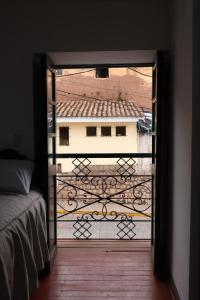 Postel nebo postele na pokoji v ubytování Millas House Cusco