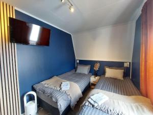 Letto o letti in una camera di The perfect stop - 3rd floor & Lodge