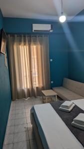 Voodi või voodid majutusasutuse Hotel Theoxenia toas