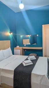 Voodi või voodid majutusasutuse Hotel Theoxenia toas