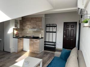 Kuchyň nebo kuchyňský kout v ubytování Apartman 24