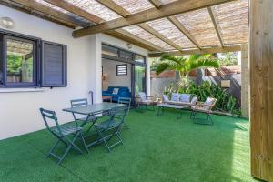Κήπος έξω από το CORAIL - Maison 2 chambres à 50 m de la plage de l'Etang-Salé-les-Bains