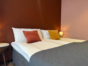 Postel nebo postele na pokoji v ubytování Hotell Sillen