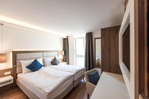 Postel nebo postele na pokoji v ubytování Hotel Rubus