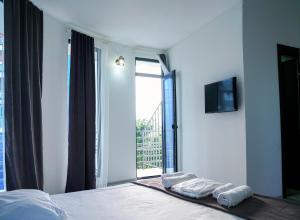 Letto o letti in una camera di Hotel General Tso Kobuleti