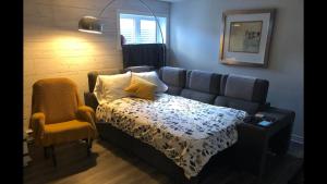 Giường trong phòng chung tại Simplement l’Harmonie à Chambly
