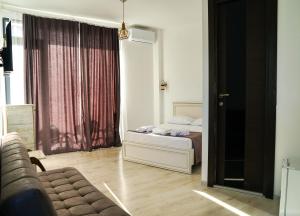 Letto o letti in una camera di Hotel General Tso Kobuleti