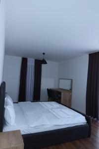 Voodi või voodid majutusasutuse Andoena Resort toas