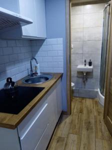 Photo de la galerie de l'établissement Doba Rent POKOJE CENTRUM PAŁACOWA, à Białystok