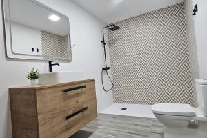 Ένα μπάνιο στο Apartamento turístico Ma&Lu