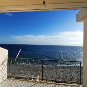 a view of the ocean from a balcony at Ionio in Reggio Calabria