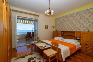 Posteľ alebo postele v izbe v ubytovaní Marin Apartments