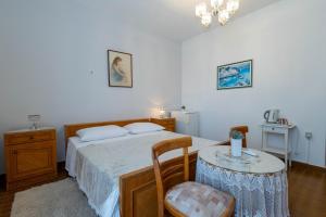 Posteľ alebo postele v izbe v ubytovaní Marin Apartments