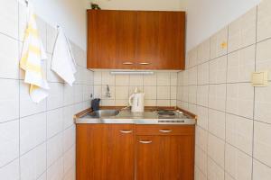 Kuchyňa alebo kuchynka v ubytovaní Marin Apartments