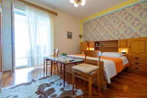 Posteľ alebo postele v izbe v ubytovaní Marin Apartments