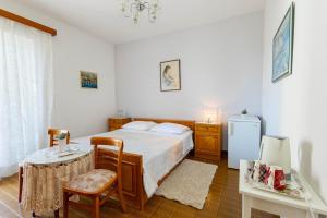 Posteľ alebo postele v izbe v ubytovaní Marin Apartments