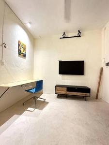Televisyen dan/atau pusat hiburan di Bonito Loft en Merida, Yuc