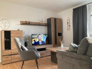 TV a/nebo společenská místnost v ubytování Drehbrücke