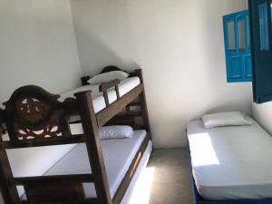Voodi või voodid majutusasutuse Casa Santorini toas