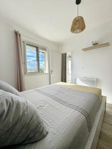 Posteľ alebo postele v izbe v ubytovaní Appartement centre ville 4 personnes à Palavas les flots