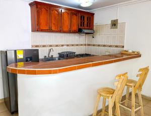 Kuchyň nebo kuchyňský kout v ubytování Hostal Miami Beach